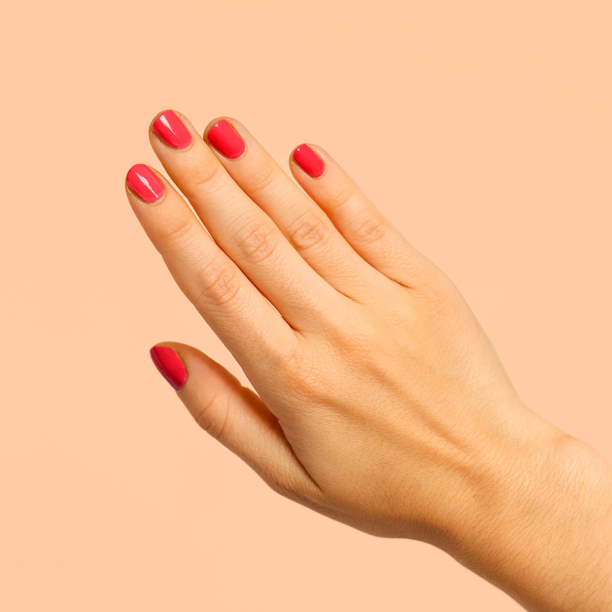 Coral Crush BKIND nail polish vegan 21-free 77% plant-based