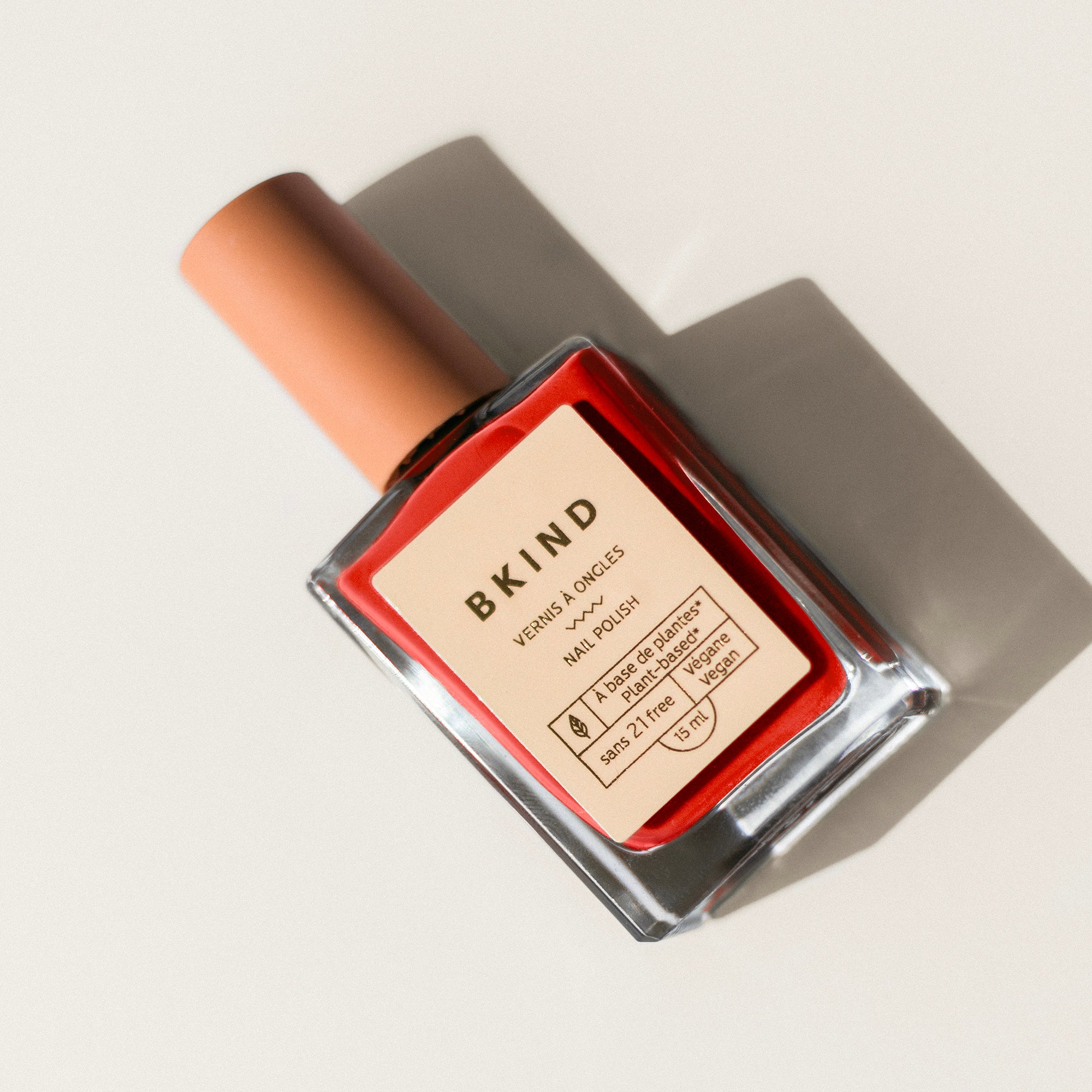 Sunburn nail polish BKIND vegan 21-free plant-based polish