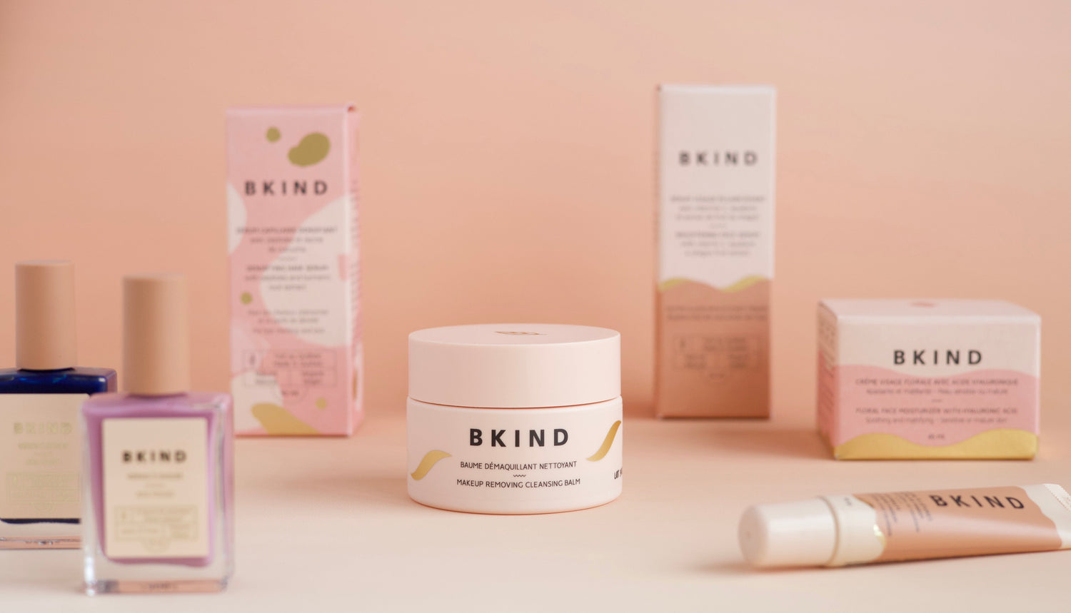 BKind skincare products on a peach-colored background